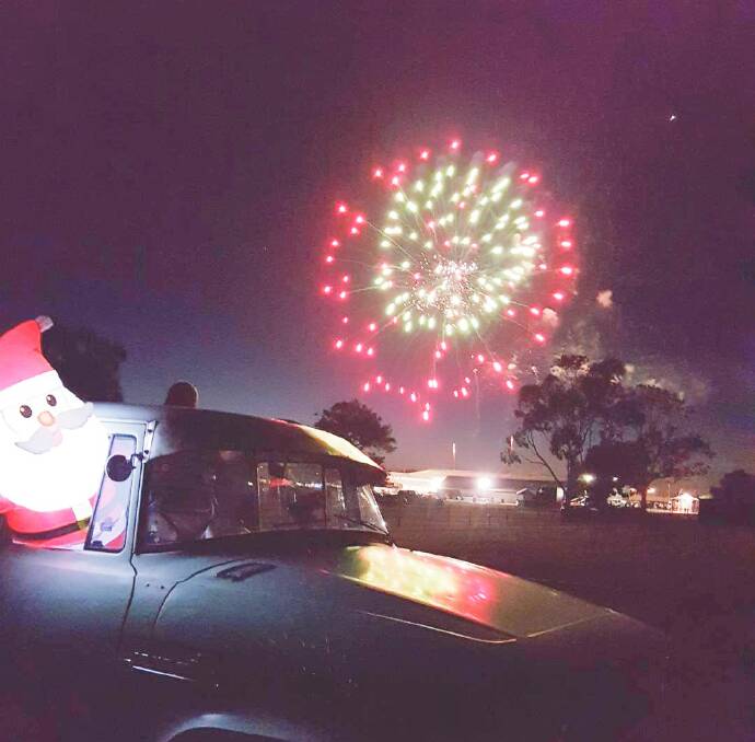 CAR LOVE: SImon Clark's ute with a special passenger during the fireworks at 2021 Kannamaroo. Picture: CONTRIBUTED