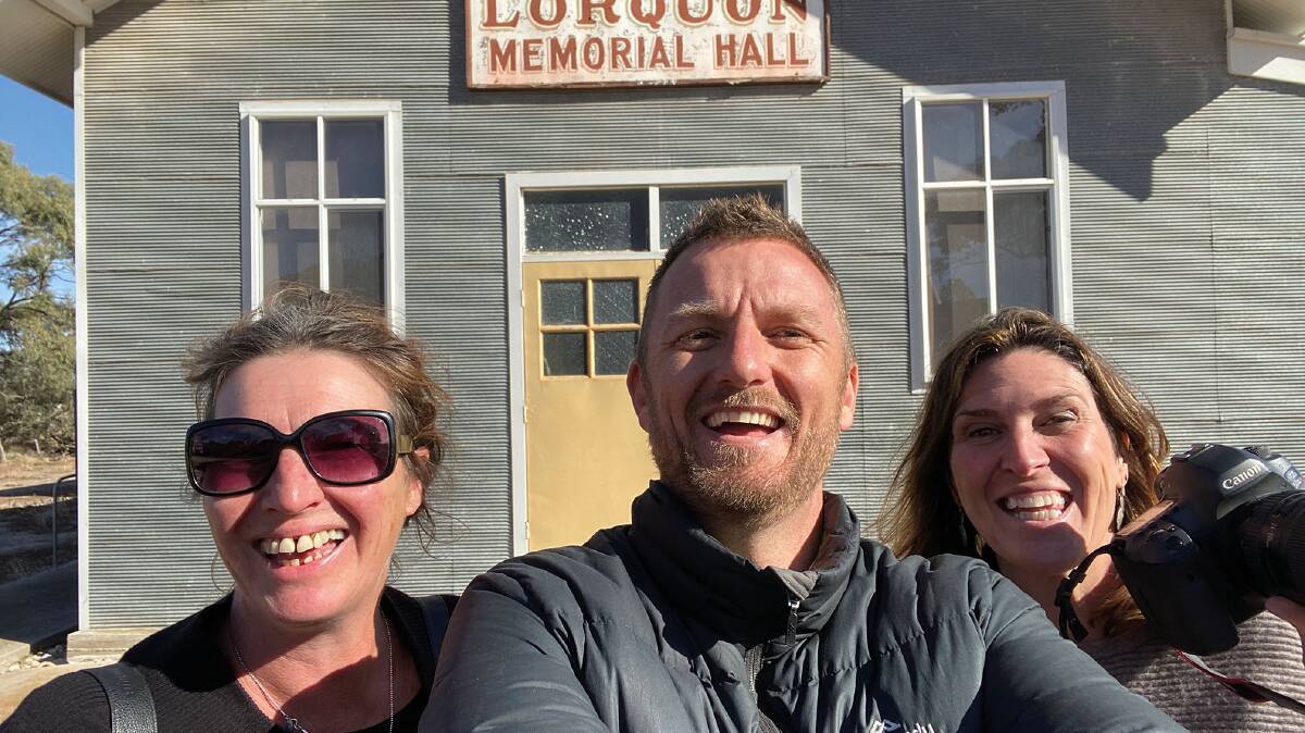 JOURNEY: Author Adam McNicols with two of the books photographers, Erin Jonasson and Melanie Faith Dove taking a selfie mid Wimmera travels. Picture: CONTRIBUTED