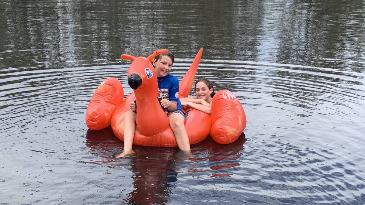 FLOAT ON: Jye and Mikayla Frizon from Horsham are enjoying the Wimmera River in Horsham. Picture: ALISON FOLETTA.