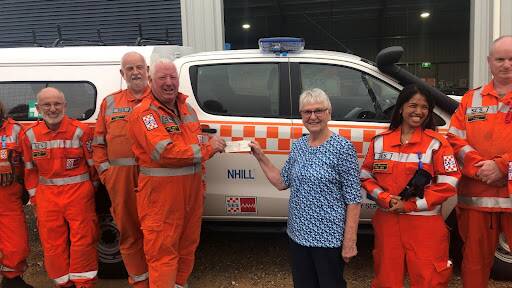 COMMUNITY: Nhill SES unit controller Des Smith accepting the donation from Sadie Williams who volunteers at the craft shop. Picture: CONTRIBUTED