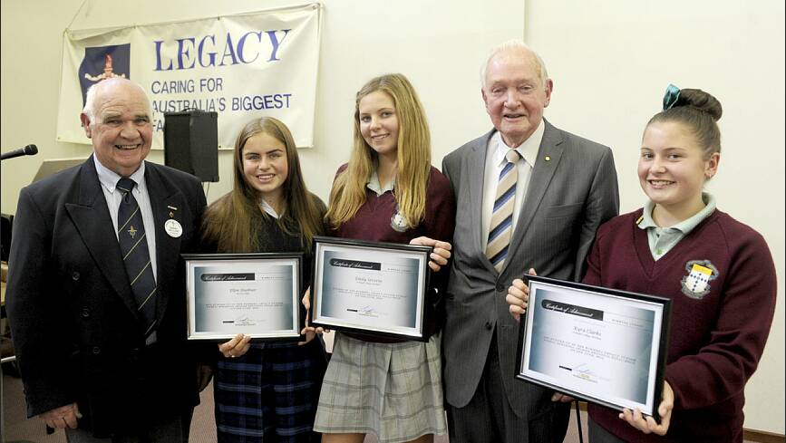 EXEMPLARY SPEAKERS: Eleven Wimmera students took to the stage for the Wimmera Legacy Junior Public Speaking Competition on Friday. Pictured from left are Wimmera Legacy Club president Barry McClure, Murtoa College's Ellen Huebner, third, St Brigid's Emily Severin, first, chief judge John Nunn and St Brigid's College Kyra Clarke, second. Picture: SAMANTHA CAMARRI
