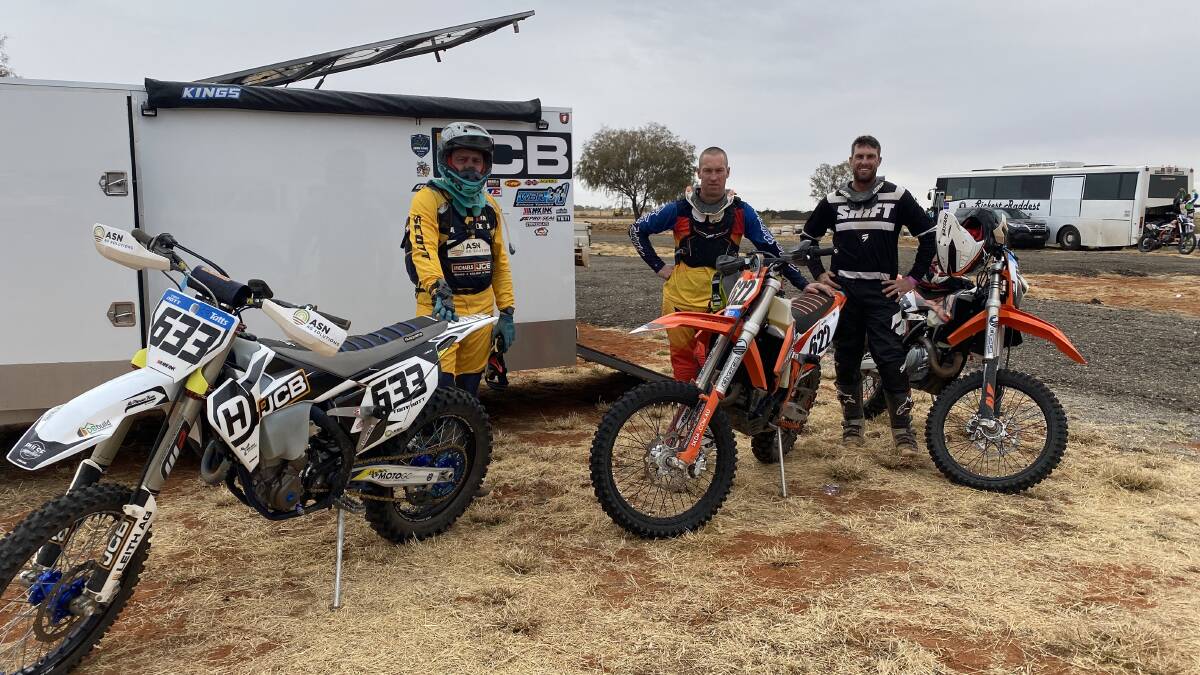 DESERT: Tony Nott (left), Phil Streeter and Brad Leith with their motorbikes before the race. Picture: CONTRIBUTED