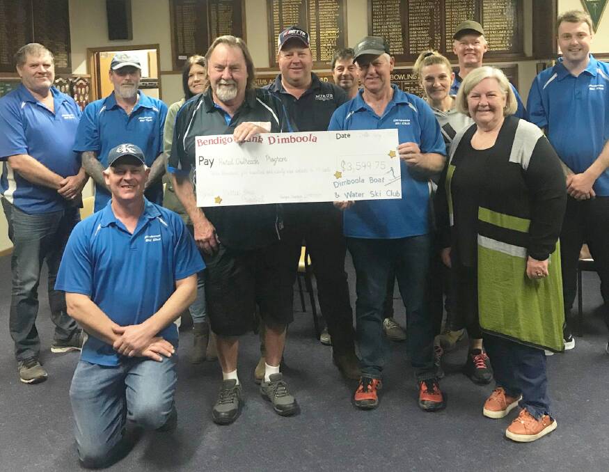 THANKS: Rural Outreach program's Mal Coutts receiving a donation from the Dimboola Boat and Water Ski club. Picture: CONTRIBUTED