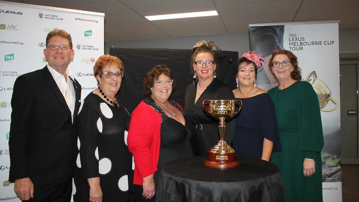 EVENTS: Jim Alexander (left), Robyn Hendy, Amanda Munn, Kaye Bothe, Kylie King, Raelene Alexander stand with the Melbourne Cup as it makes a stop over in Kaniva. Picture: HELEN HOBBS