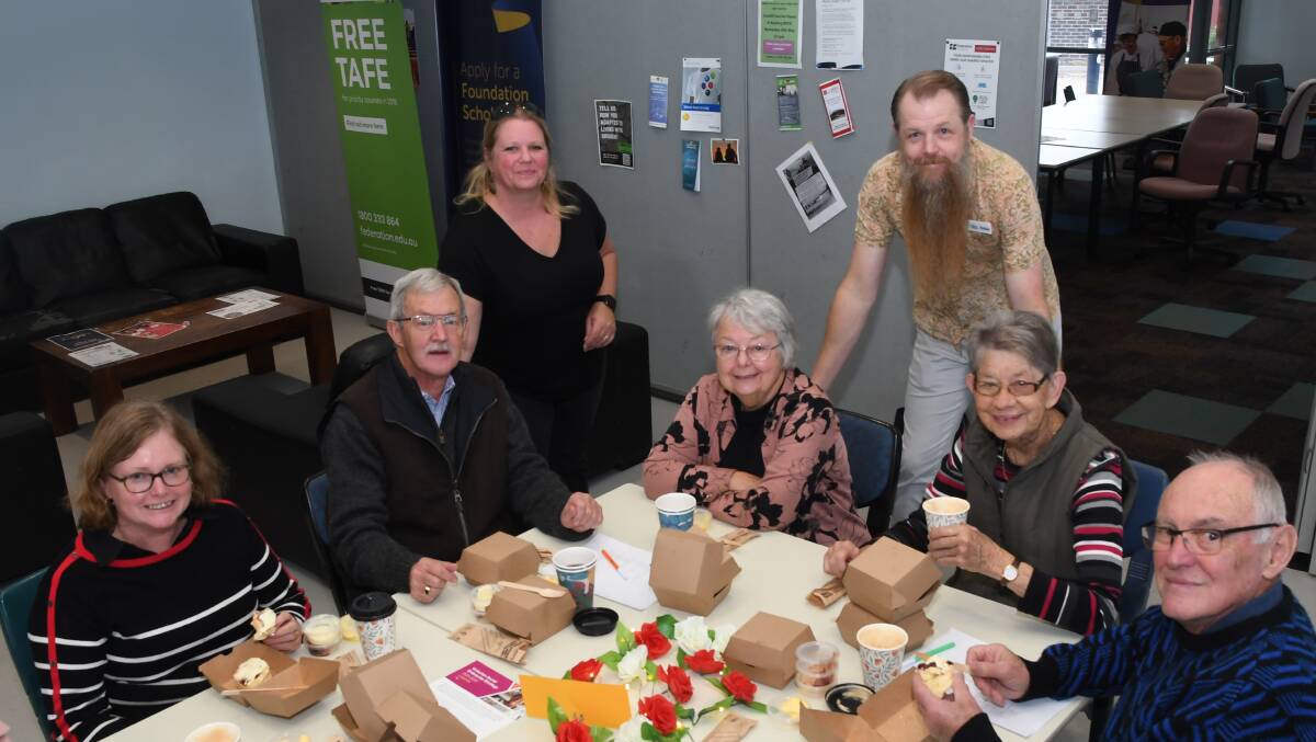WELL DONE: Centre for Participation Wimmera coordinator Marieke Dam and chief executive Robbie Millar with a group of volunteers at the organisation's National Volunteer Week afternoon tea. Picture: ALEX DALZIEL