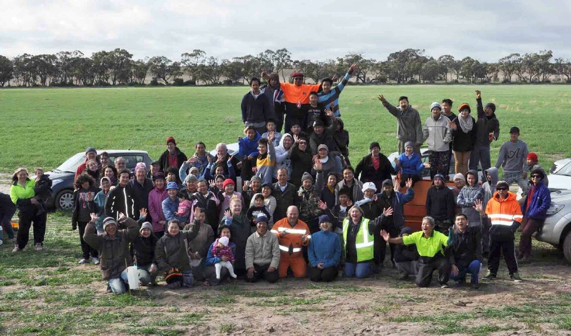 GREEN THUMB: Hindmarsh Landcare Network volunteers for the 2014 annual tree planting event. Picture: CONTRIBUTED