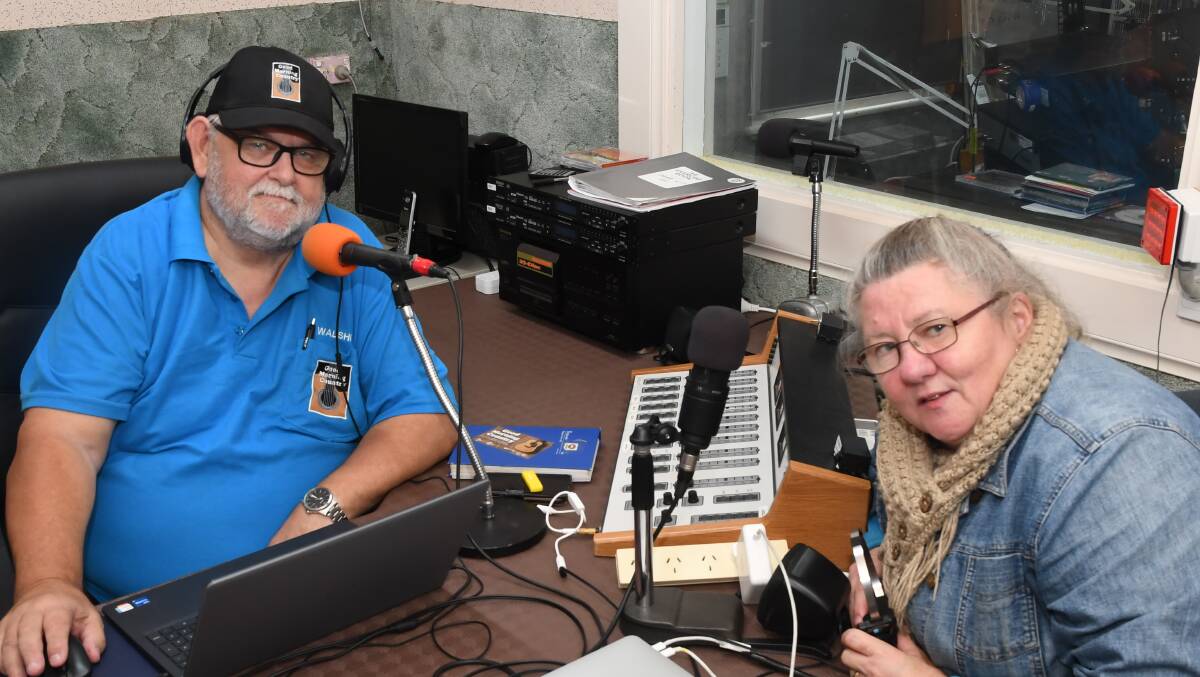 PROGRAM: Good Morning Country announcer Kevin 'Walshie' Walsh in the Triple H studio with Triple H announcer Heather Farrell. Picture: ALEX DALZIEL