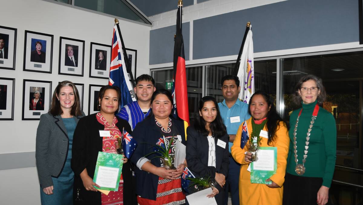 WELCOME: Lowan member Emma Kealy and Horsham mayor Robyn Gulline with the new citizens. Picture: ALEX BLAIN