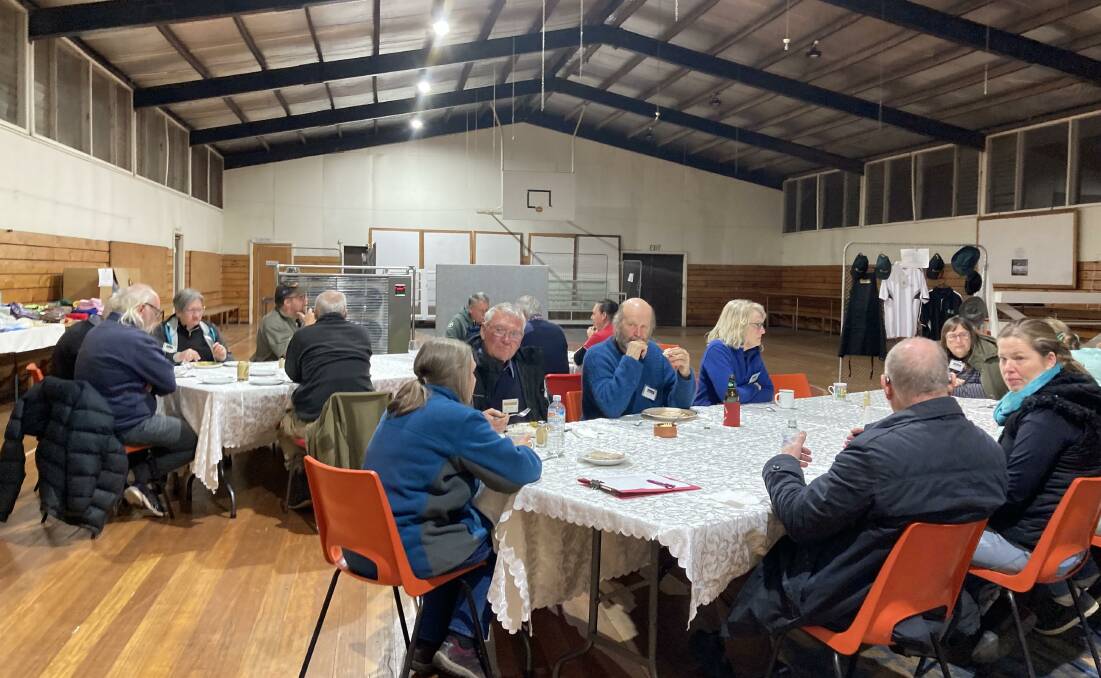 VOLUNTEERS: Volunteers enjoy an evening dinner at Edenhope Showgrounds home of the camp. Picture: CONTRIBUTED
