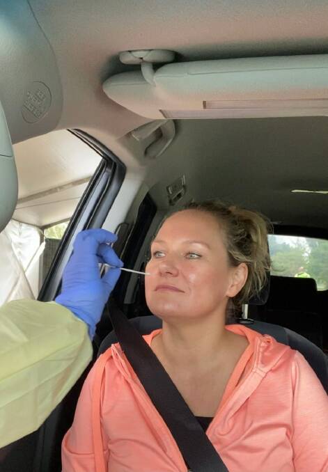 TICKLES: Cross Border Call Out founder Paula Gust receiving a COVID-19 test at a drive-through testing clinic. Picture: CONTRIBUTED