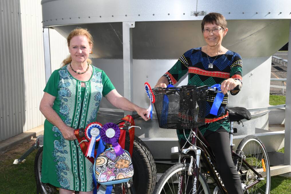 BIKING: Natimuk Agricultural Society secretary Judith Bysouth with steward Meg Sleeman standing with their decorated bicycles. Picture: ALEX DALZIEL