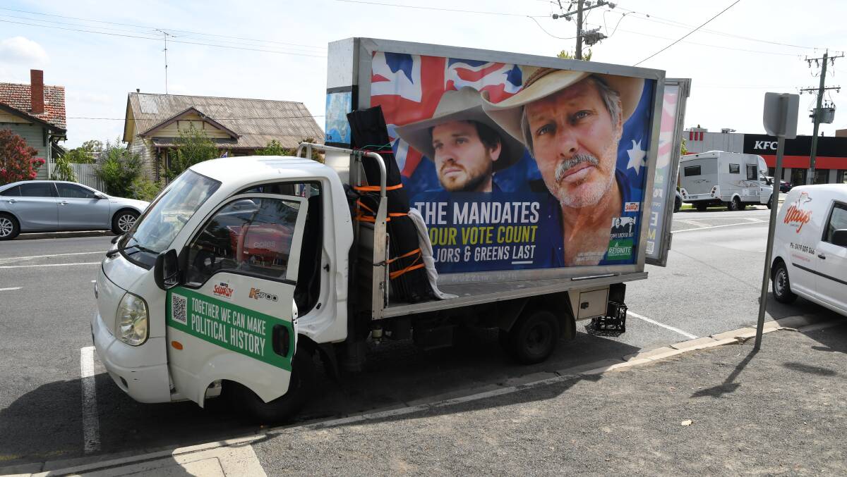 MESSAGE: Truck with the words "end the mandate" printed on an advertisement. Picture: ALEX DALZIEL