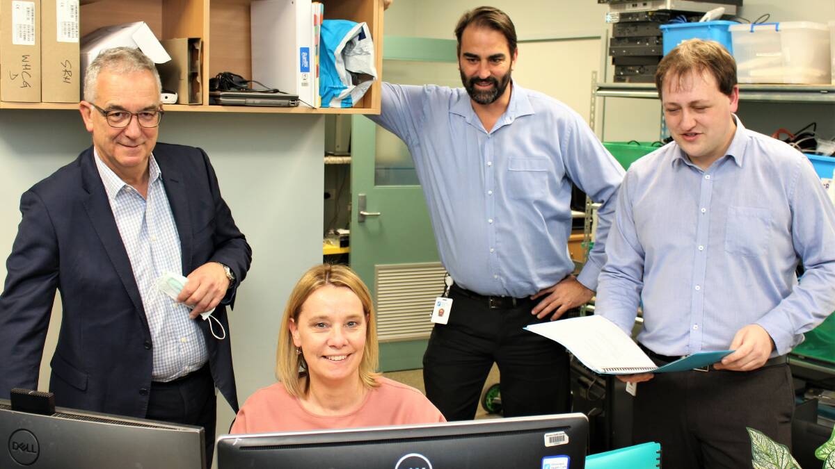IT: Wimmera Health Care Group director of Corporate Services Mark Knights (left) with IT administrator Nicki Seymour, IT manager Peter Brennan and systems officer Anthony Krahe. Picture: PETER MILLER