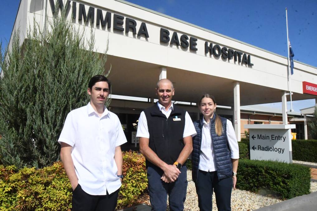 FAMILY: Jackson (left), Peter and Ella Walsgott stand out the front the Wimmera Base Hospital. Picture: ALEX DALZIEL
