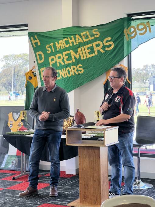 REUNION: Mark O'Beirne and Mark O'Connor speaking at St Michael's 1991 premiership reunion. Picture: SCOTT BOND