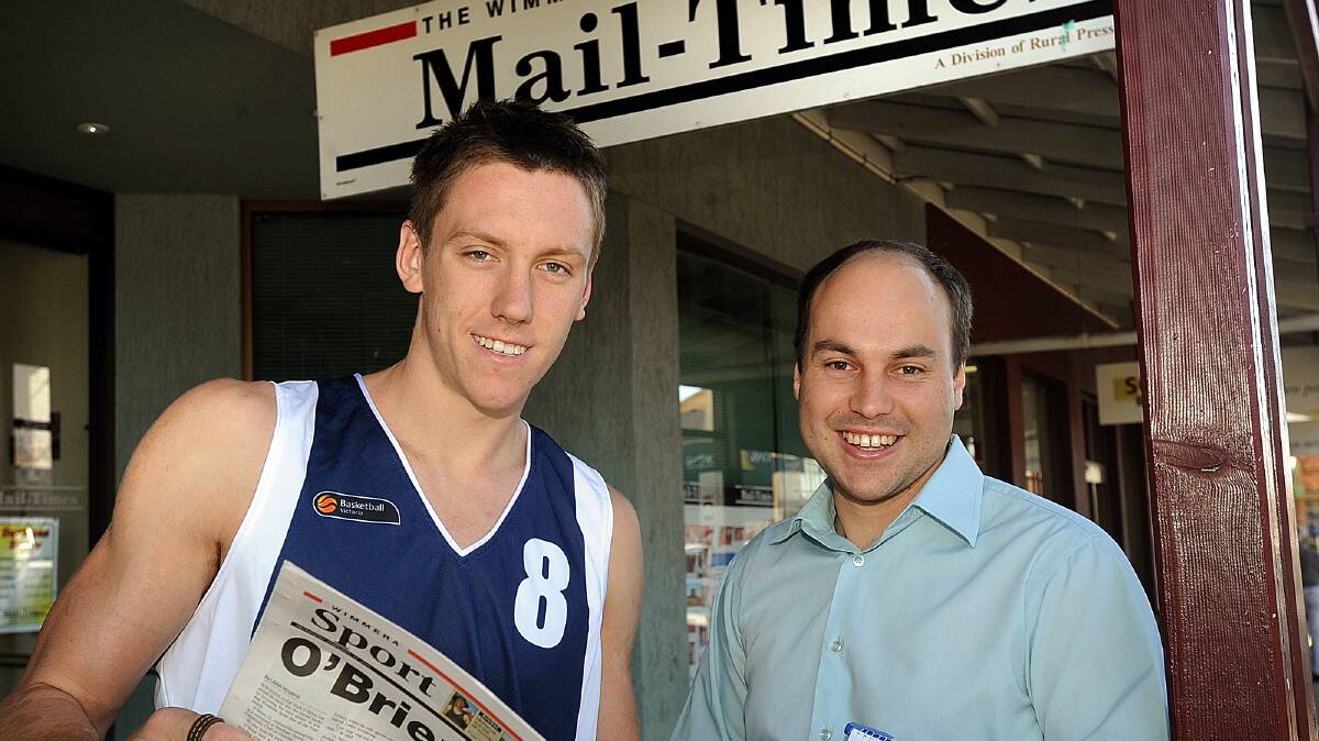 THROWBACK: NBL star and former Horsham Hornet Mitch Creek with Roy Ward in 2010. Ward won the 2021 Basketball Victoria Media Award. Picture: FILE