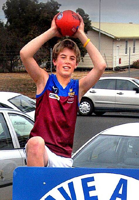 THROWBACK: A young Chris Curran poses in his Horsham Demons jumper in 2004. Picture: FILE