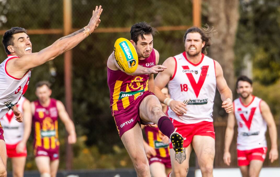 STAR: Delahunty gets a kick away for Subiaco under pressure from South Fremantle, the two teams will meet in Saturday's decider. Picture: JACK FOLEY