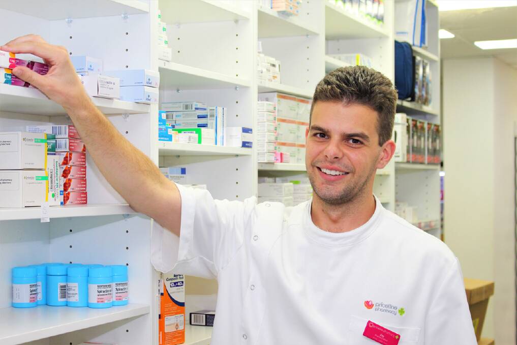 NEWCOMER: Horshams newest pharmacist Jay Hogan checks pharmaceutical stocks at Horsham Priceline. Picture: CONTRIBUTED
