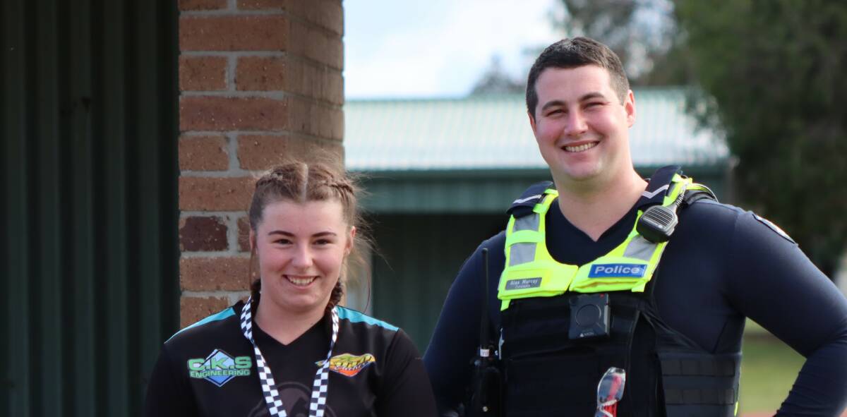 TENACIOUS: Netball award winner Isabella Tulloch photographed receiving her award at North Park from Stawell's officer Alex Murray. Picture: CONTRIBUTED