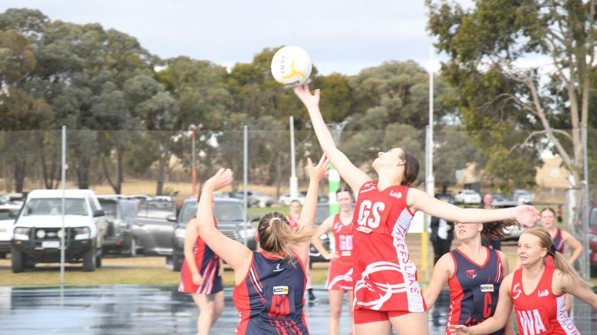 BRUSHING FINGERTIPS: Chloe Kelm leaps to snatch a flying ball out of the air against Laharum in 2021. Picture: FILE