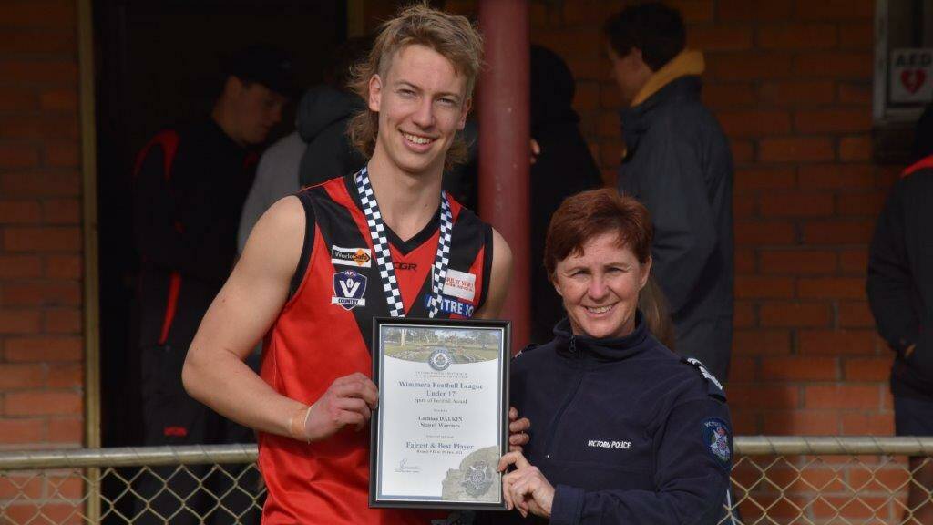 RISING STAR: Lachlan Dalkin photographed receiving his award from Stawell police Officer Jo Orr at Central Park on Saturday.