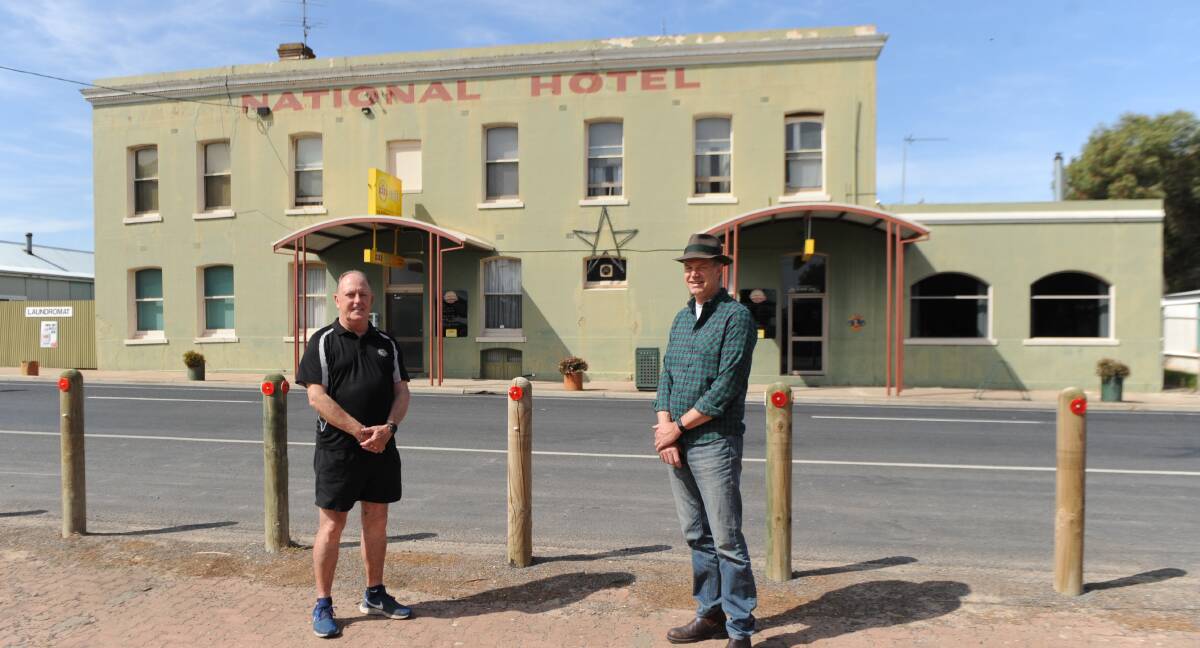 NATI's NAT: National Hotel Licensee Bill Lovel with Dr Rob Grenfell, who is asking each resident to buy one takeaway meal from the venue a week. Picture: ALEXANDER DARLING