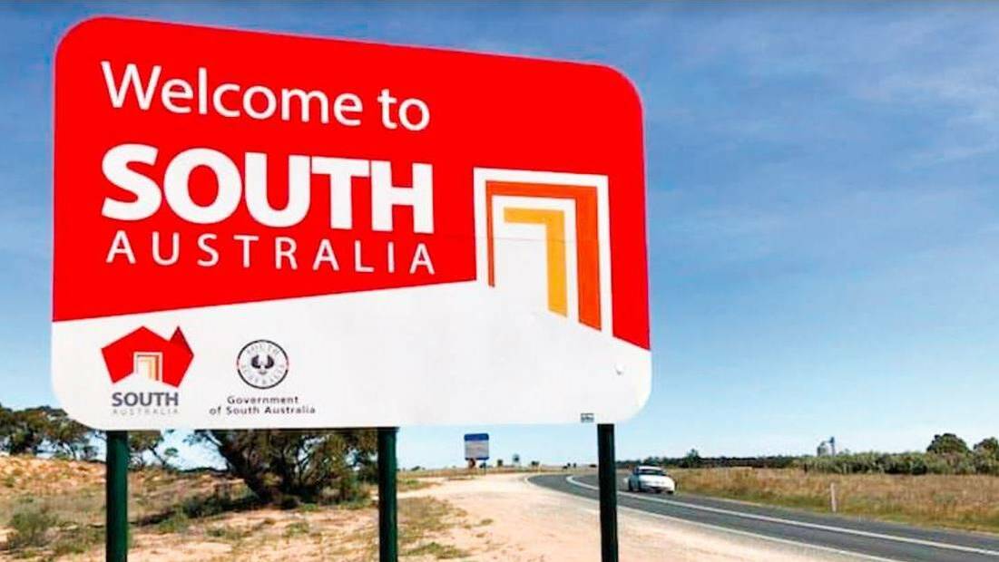 Long lines at border crossings as South Australia shuts to Victoria