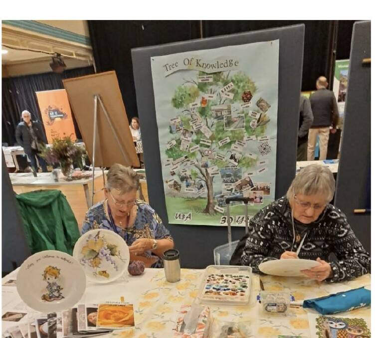 Joyce Lane & Lorraine McKenzie focused on their China Painting. Picture supplied