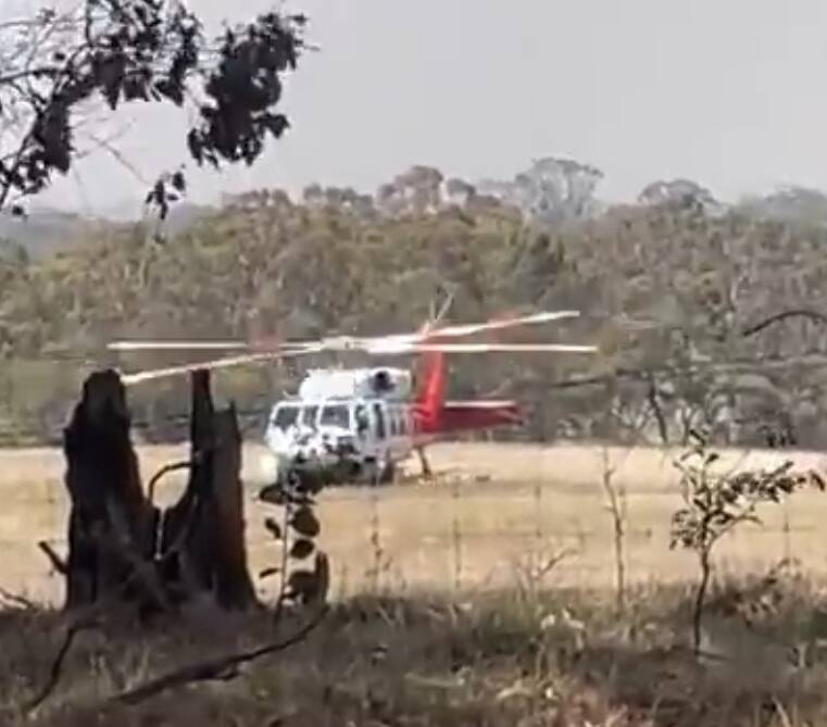 Helicopter landing in paddocks near the Grampians fire February 2024 Picture supplied