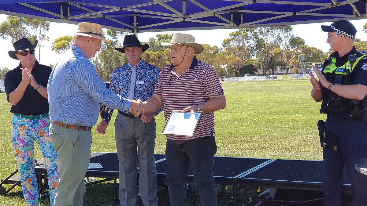 President Robert Rogers gave a brief citation of the past 50 years of service that Max Schmidt has given to the Natimuk A and P Show Society. Picture Supplied