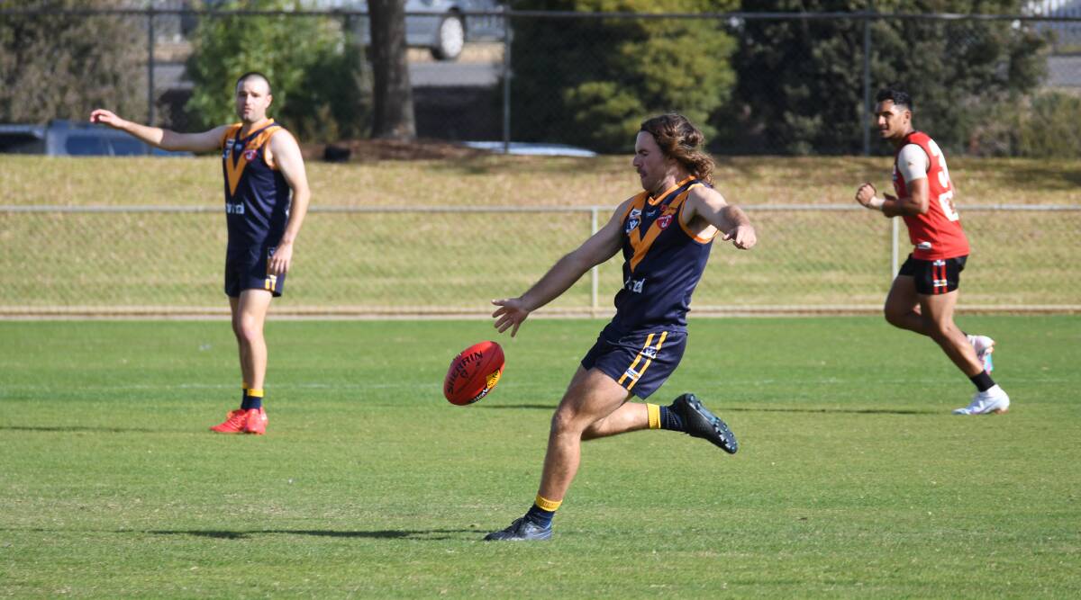 Nhill's Toby Marshall kicks long during the round four WFNL match against Stawell. Picture by Ben Fraser