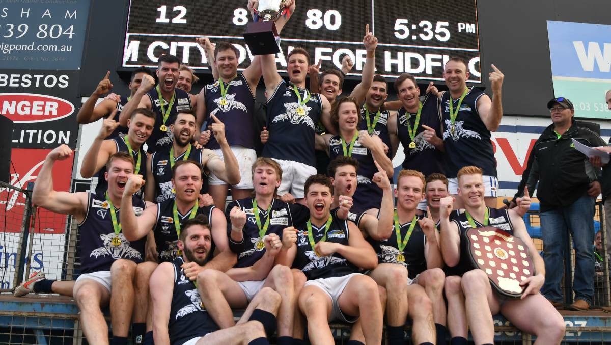 Rupanyup Panthers hold high the trophy after winning the 2022 HDFNL grand final. File picture