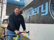 Owner of Horsham Cyclery, Damien Cook eagerly anticipates the Olympic Games cycling event. Picture by John Hall