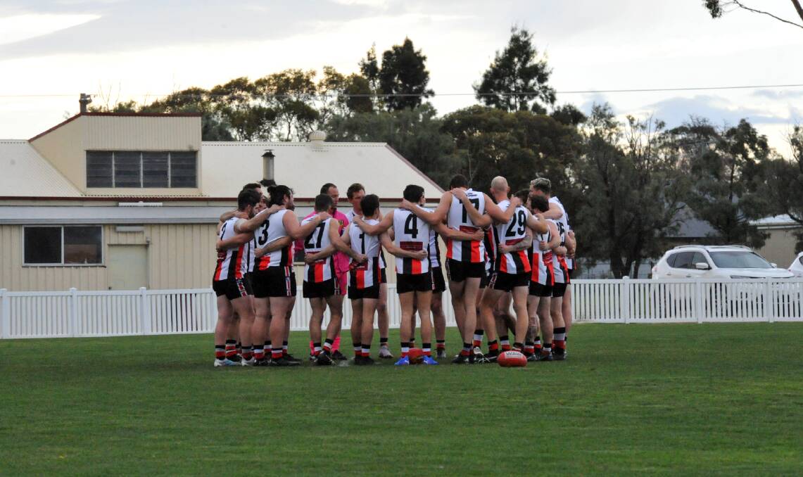Edenhope Apsley footballer in a team huddle ahead of the sides game against Natimuk United at the Natimuk Showgrounds in round nine of the HDFNL on Saturday, June 17. Picture by John Hall