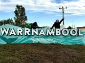 triple j's Luka Muller and Concetta Caristo pose on the Warrnambool town sign. Picture by triple j/Instagram