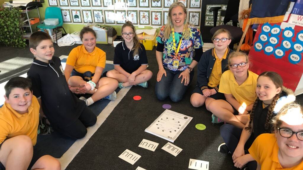 HIGH NOTE: Katie Hull-Brown with students from the Warracknabeal Primary School on Friday. Picture: SUPPLIED