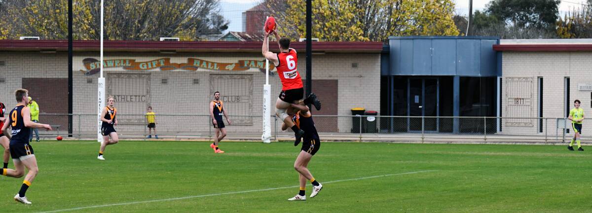 Stawell's Cody Driscoll gets up for a strong grab against Nhill in round four of the WFNL. Picture by Ben Fraser