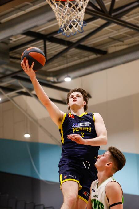 Austin McKenzie scored 15 first quarter points for the Miners Youth League team on Sunday afternoon