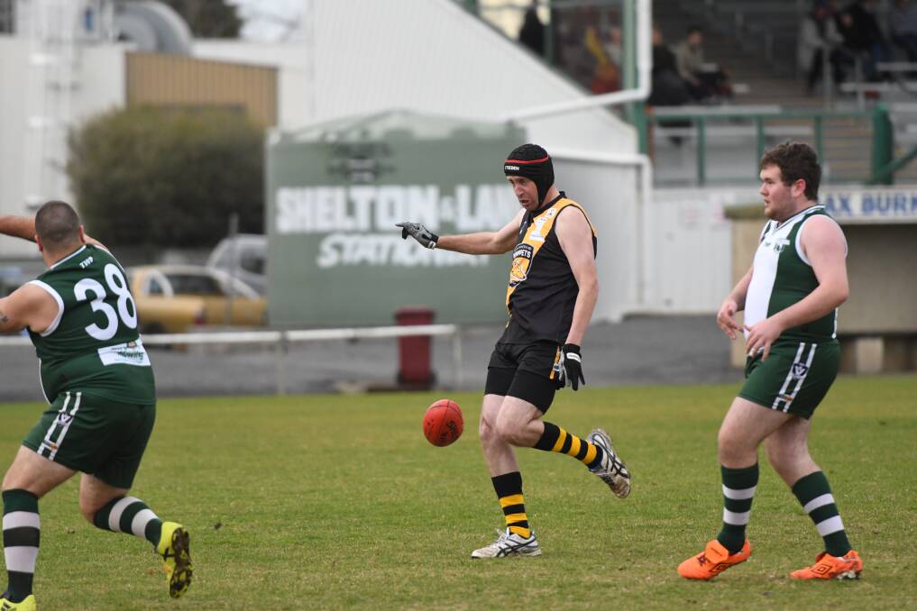 Wimmera Whippet Alfred Muller thumps the ball further down the field. Picture: MATT CURRILL