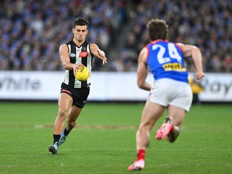 Collingwood's Nick Daicos kicked this goal but was largely kept quiet by Melbourne at the MCG. (James Ross/AAP PHOTOS)