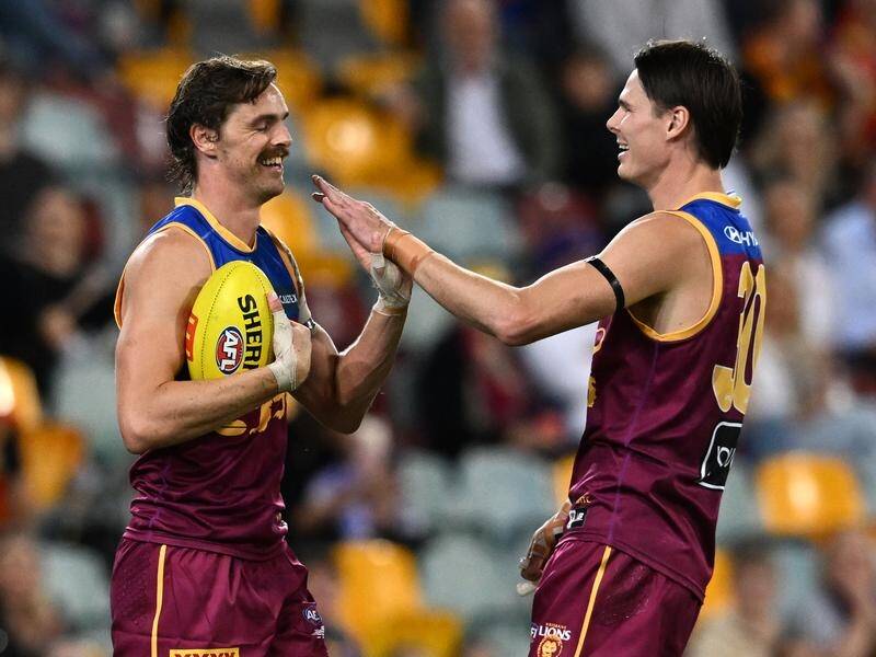 Brisbane's Joe Daniher (left) and Eric Hipwood have been firing in attack for the Lions. (Darren England/AAP PHOTOS)
