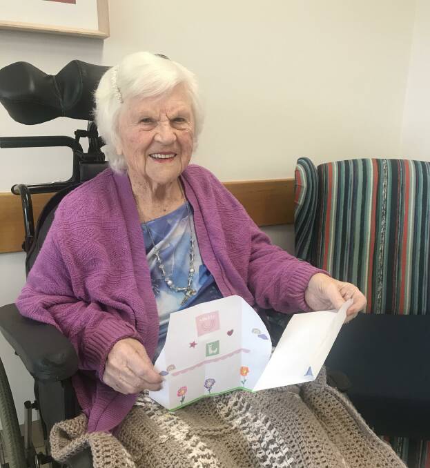 YOU'VE GOT MAIL: Wimmera Nursing Home resident Bonny Dooling receiving a child's letter. Picture: DANIELLA BELL