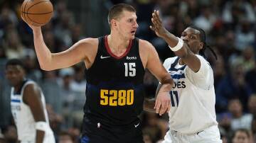 Denver Nuggets centre Nikola Jokic (left) has again been voted the NBA's most valuable player. (AP PHOTO)